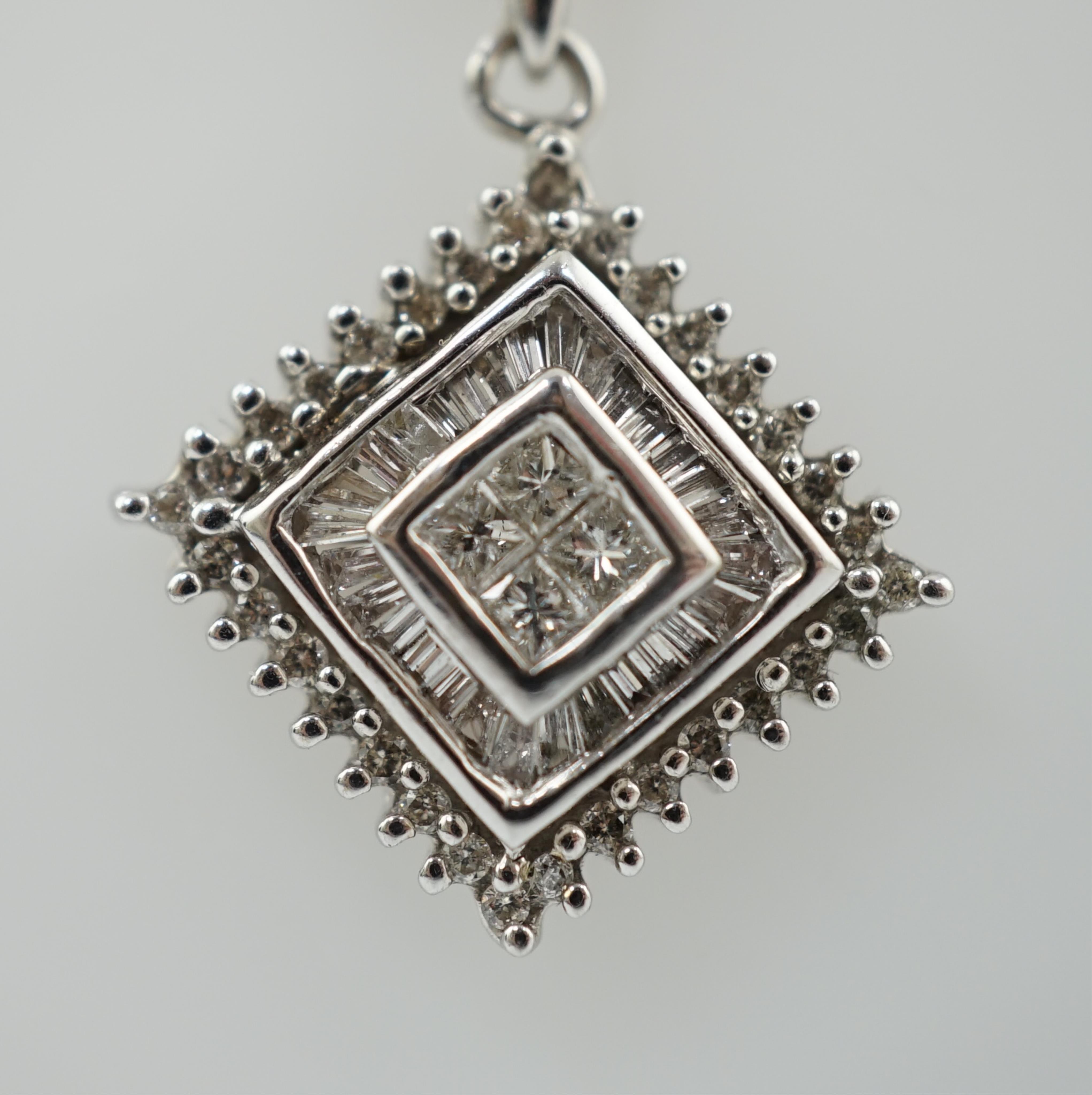 A modern 14k white gold and diamond cluster set pendant, on an Italian 18k white gold fine link chain